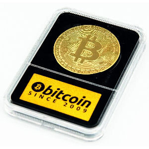 Moneda Bitcoin de oro chapada con expositor de luxe